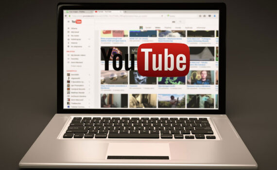 a laptop with youtube on the screen